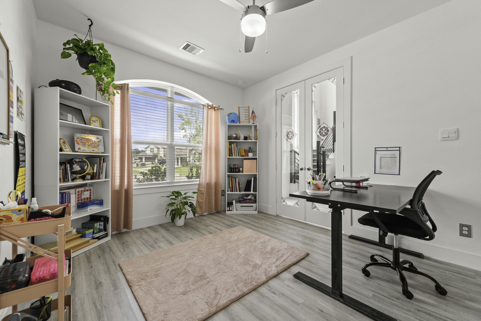 14130 Savage River Conroe, TX 77384 - Photo 5 of 33 a view of a workspace with furniture and a livingroom