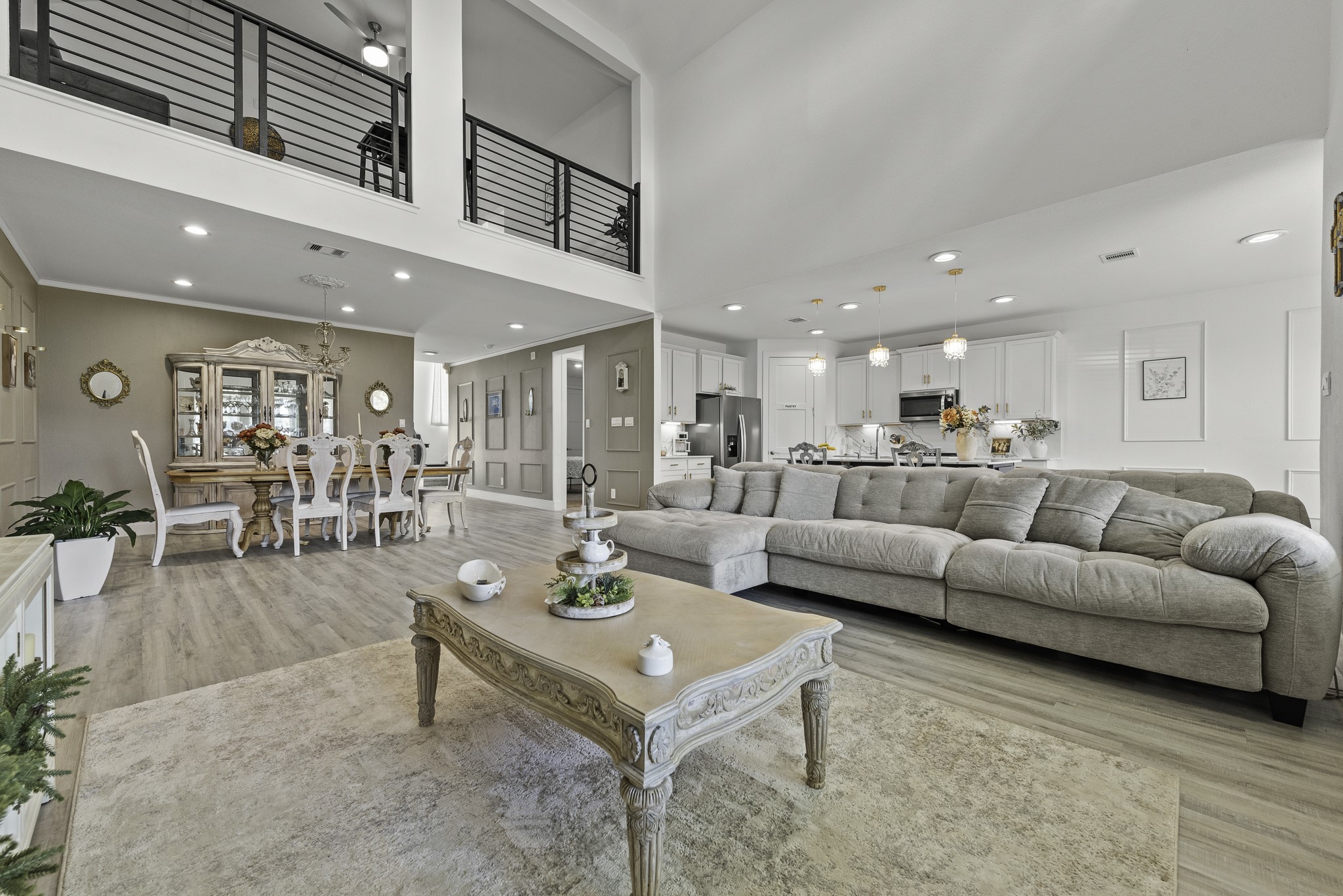 14130 Savage River Conroe, TX 77384 - Photo 10 of 33 a living room with furniture kitchen view and a table