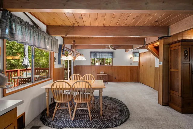 a view of a chairs and table in the patio