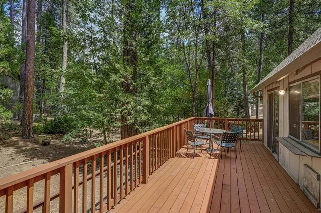 a view of balcony with furniture