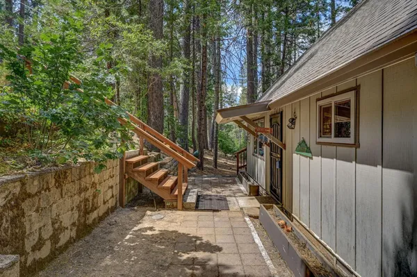 a view of stairs and wooden floor