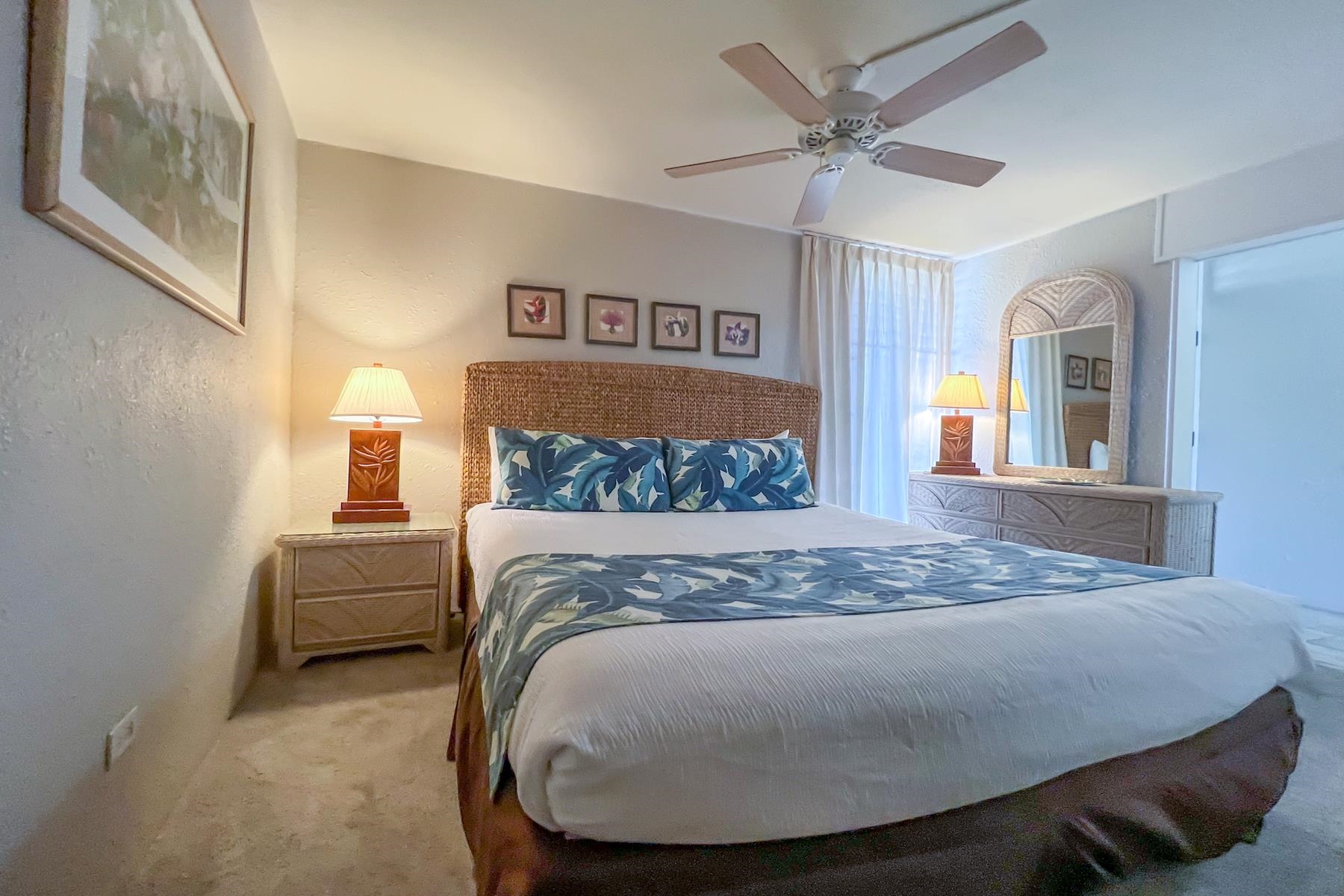 3601 Lower Honoapiilani Road, Unit 414 Lahaina, HI 96761 - Photo 14 of 28 a bed sitting in a bedroom and night stand