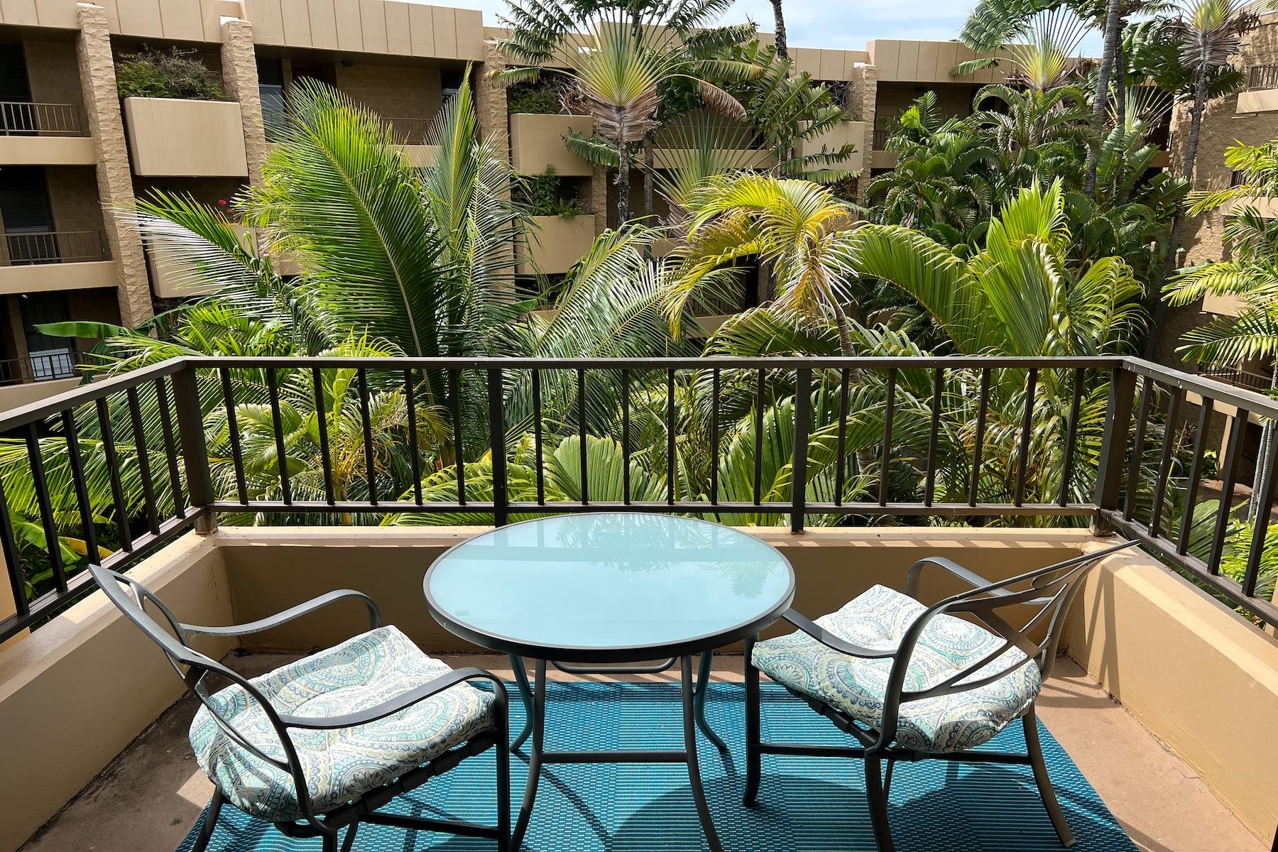 3601 Lower Honoapiilani Road, Unit 414 Lahaina, HI 96761 - Photo 8 of 28 a view of a chairs and table in the balcony