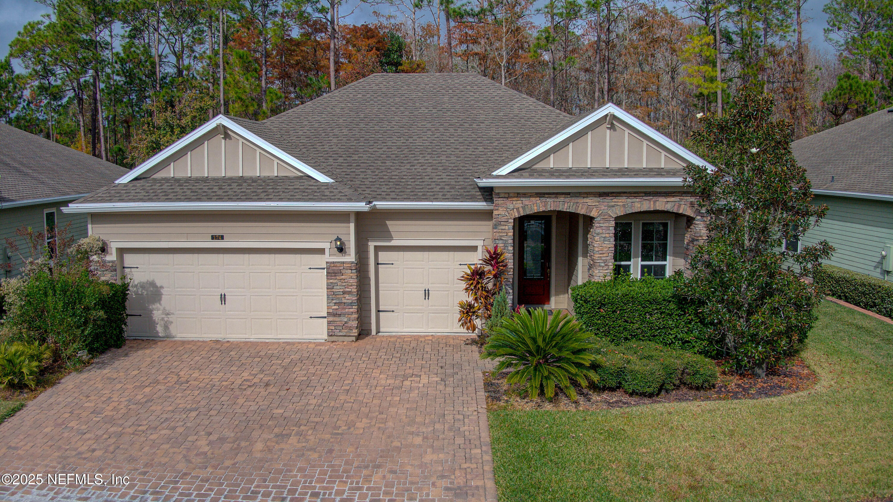 174 Antilles Road St. Augustine, FL 32092 - Photo 13 of 88 a front view of a house with yard and garage
