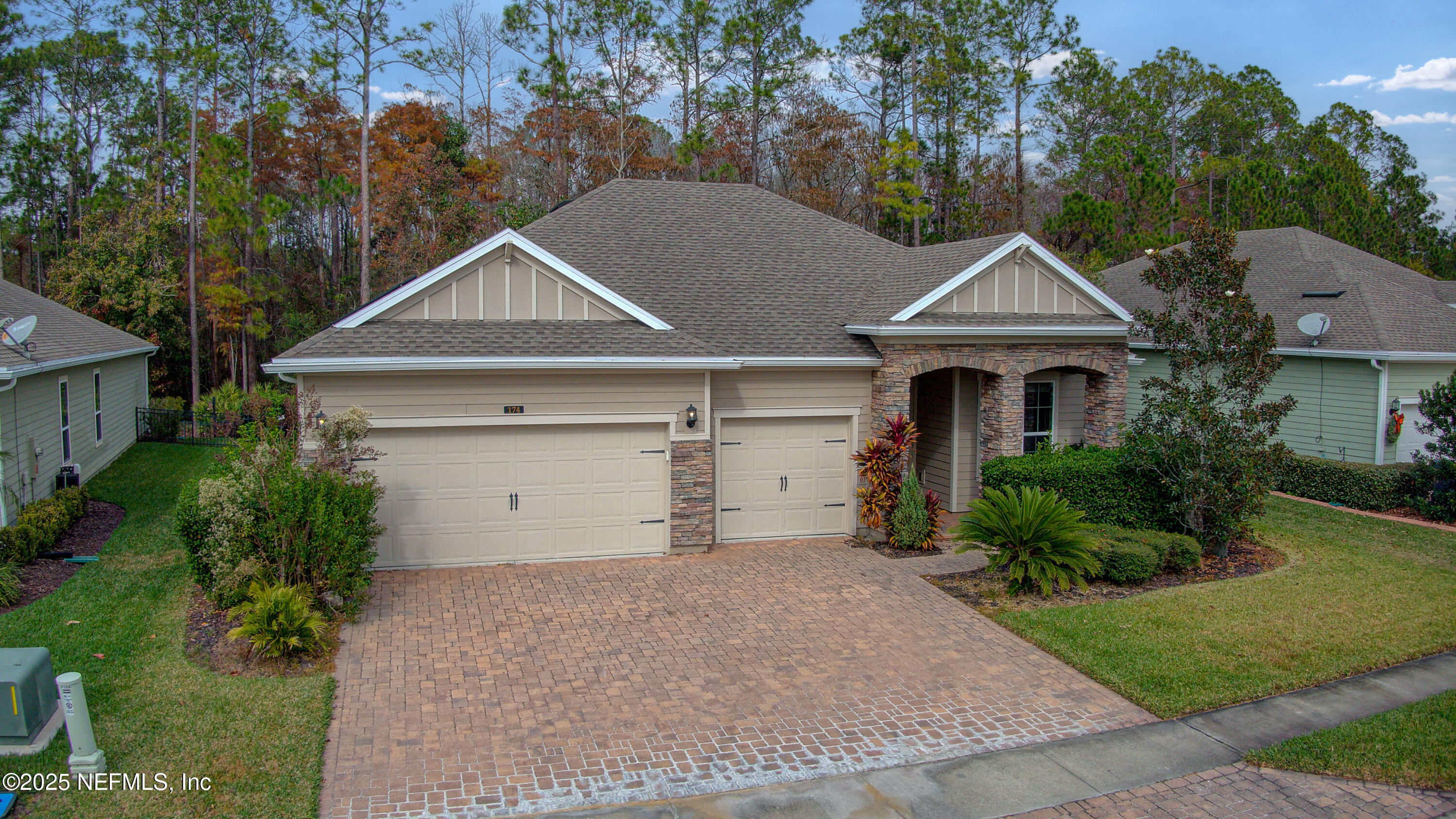 174 Antilles Road St. Augustine, FL 32092 - Photo 5 of 88 a front view of a house with a yard and garage