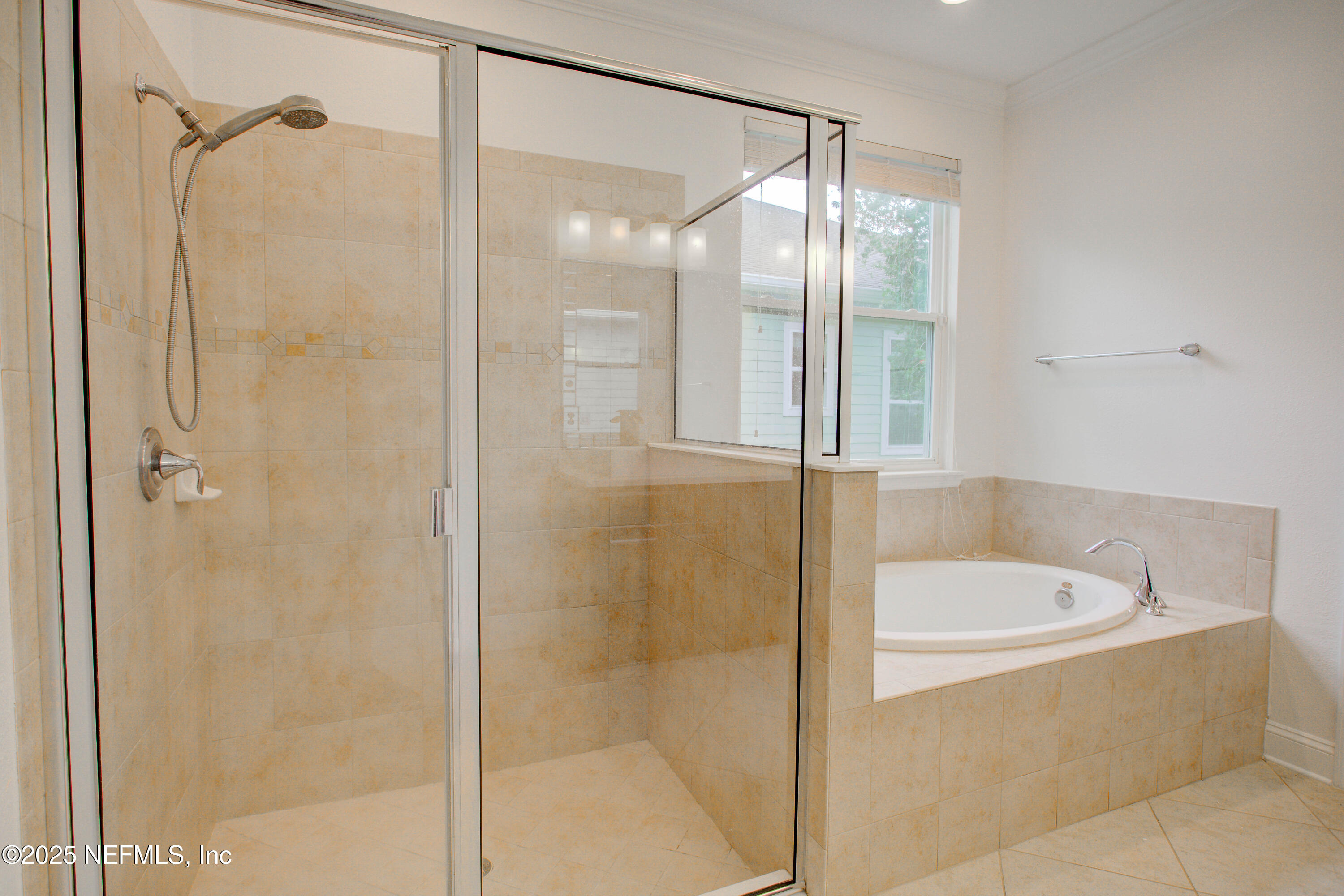 174 Antilles Road St. Augustine, FL 32092 - Photo 55 of 88 a bathroom with a bathtub and shower