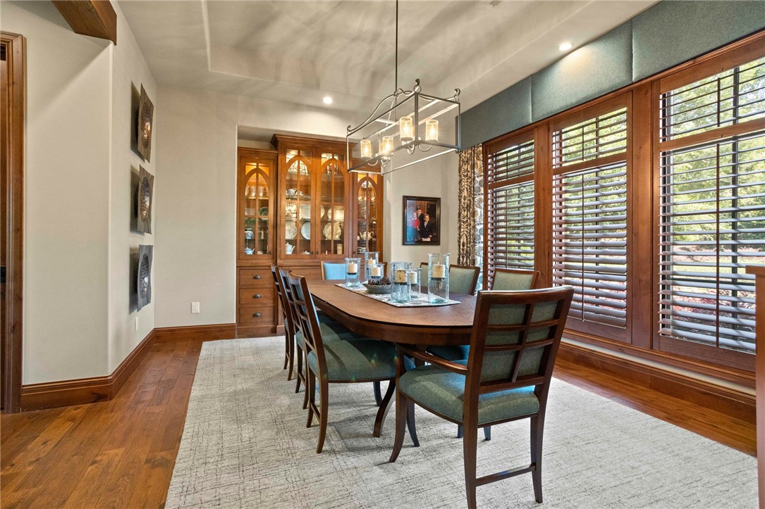 236 Palmer Way Sunset, SC 29685 - Photo 9 of 46 Custom cabinetry and warm wood tones define this inviting dining area, perfect for entertaining.