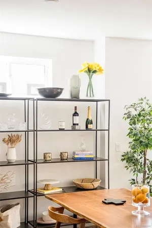 a shelf with a vase and on it