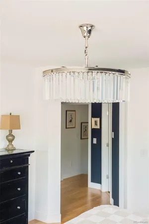 a bedroom with a bed and a table