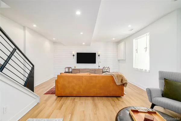 a living room with a couch and a flat screen tv