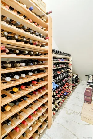 a view of a room with wooden floor and windows