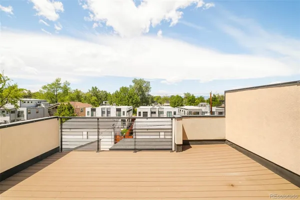 a view of a balcony with city view
