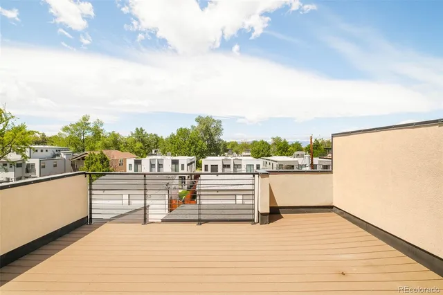 a view of a balcony with city view