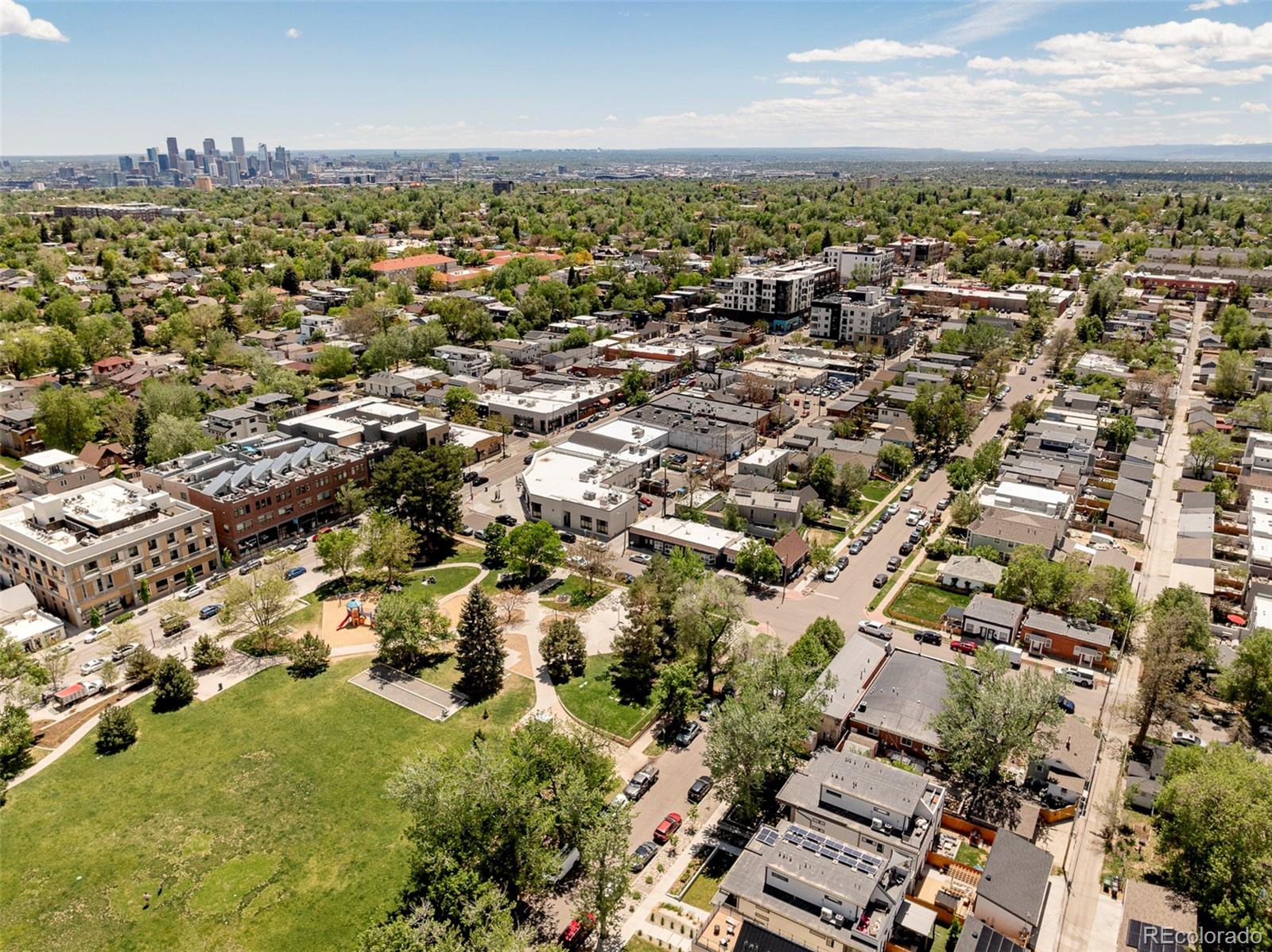 3957 Utica Street, Unit RR Denver, CO 80212 - Photo 41 of 48 an aerial view of residential building with parking space