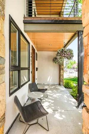 a view of a two chair in the patio