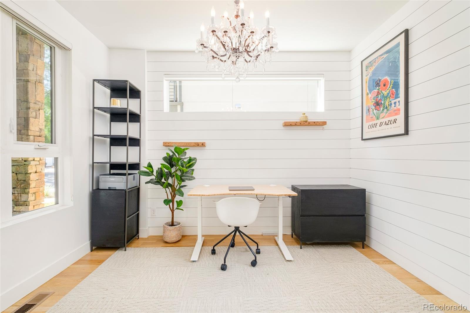 3957 Utica Street, Unit RR Denver, CO 80212 - Photo 7 of 48 a living room with furniture a chandelier and a window