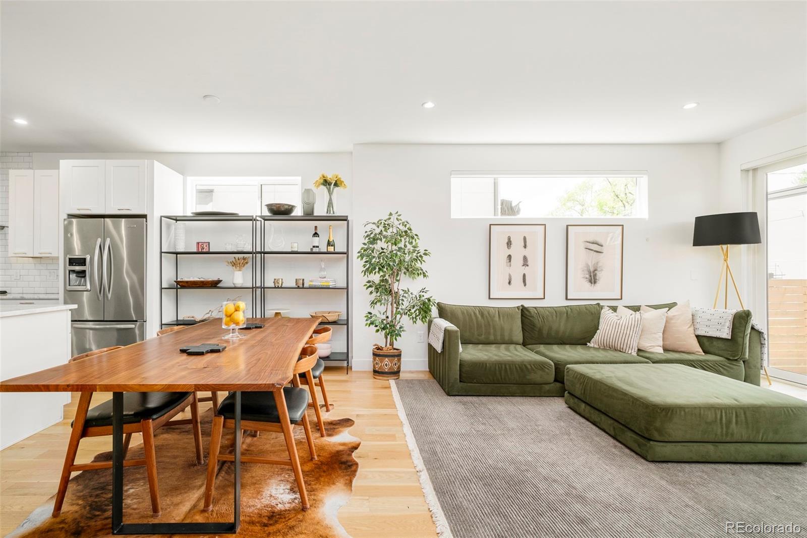3957 Utica Street, Unit RR Denver, CO 80212 - Photo 10 of 48 a living room with furniture and a table
