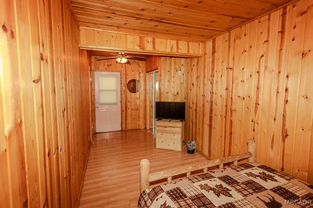 a bathroom with a shower and a sink