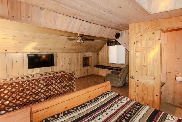 a living room with a couch and a flat screen tv