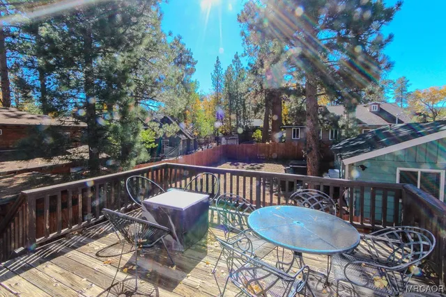 a view of a chair and table in the balcony