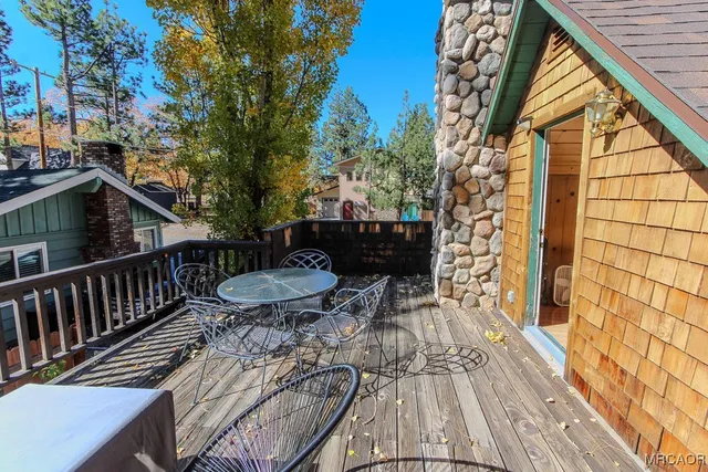 a view of balcony with furniture