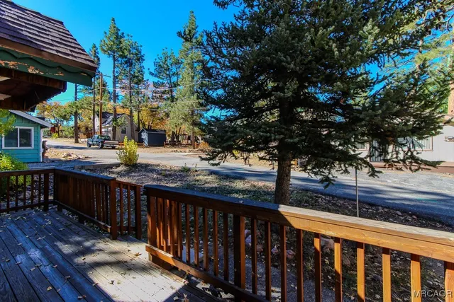 a view of street from balcony