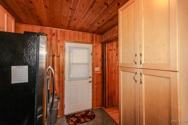 a bathroom with a shower and a sink