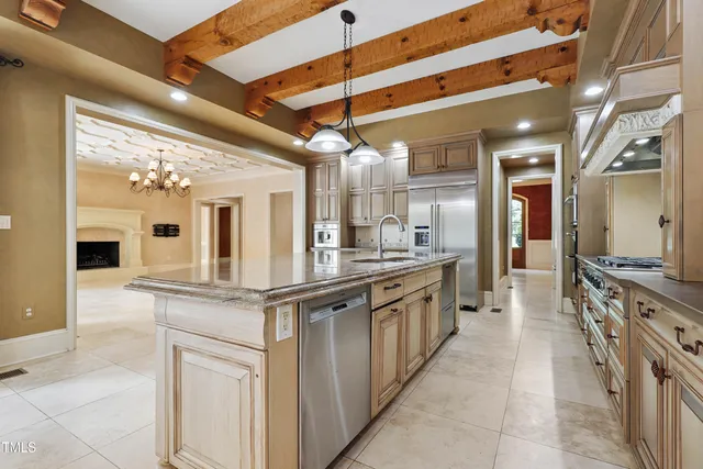 a view of an empty room and a window