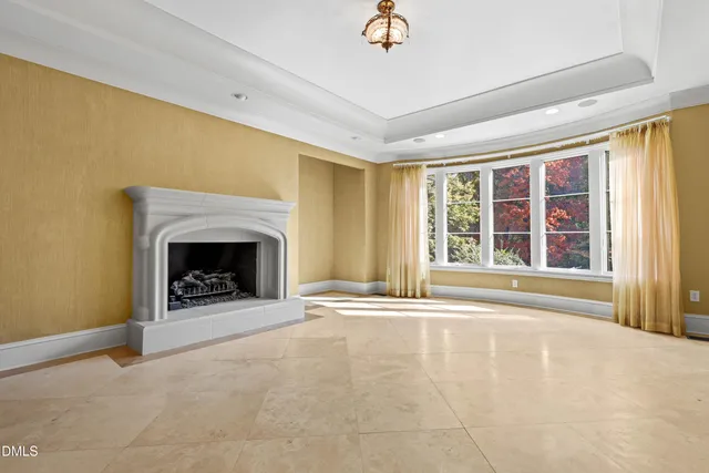 a view of gallery with large windows