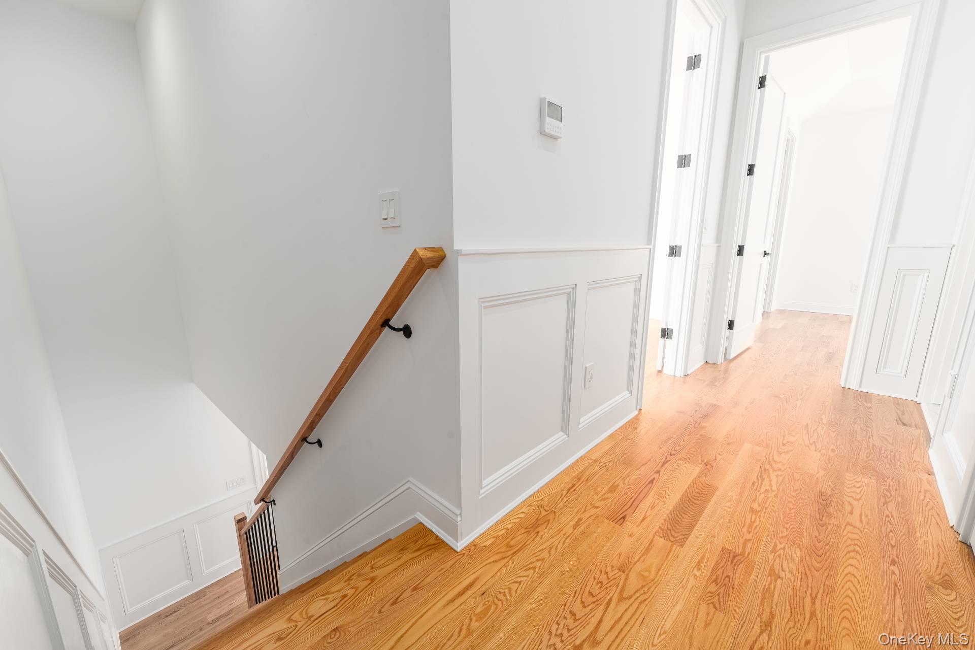 295 Grange Road Southold, NY 11971 - Photo 21 of 50 a view of a hallway with wooden floor and entryway