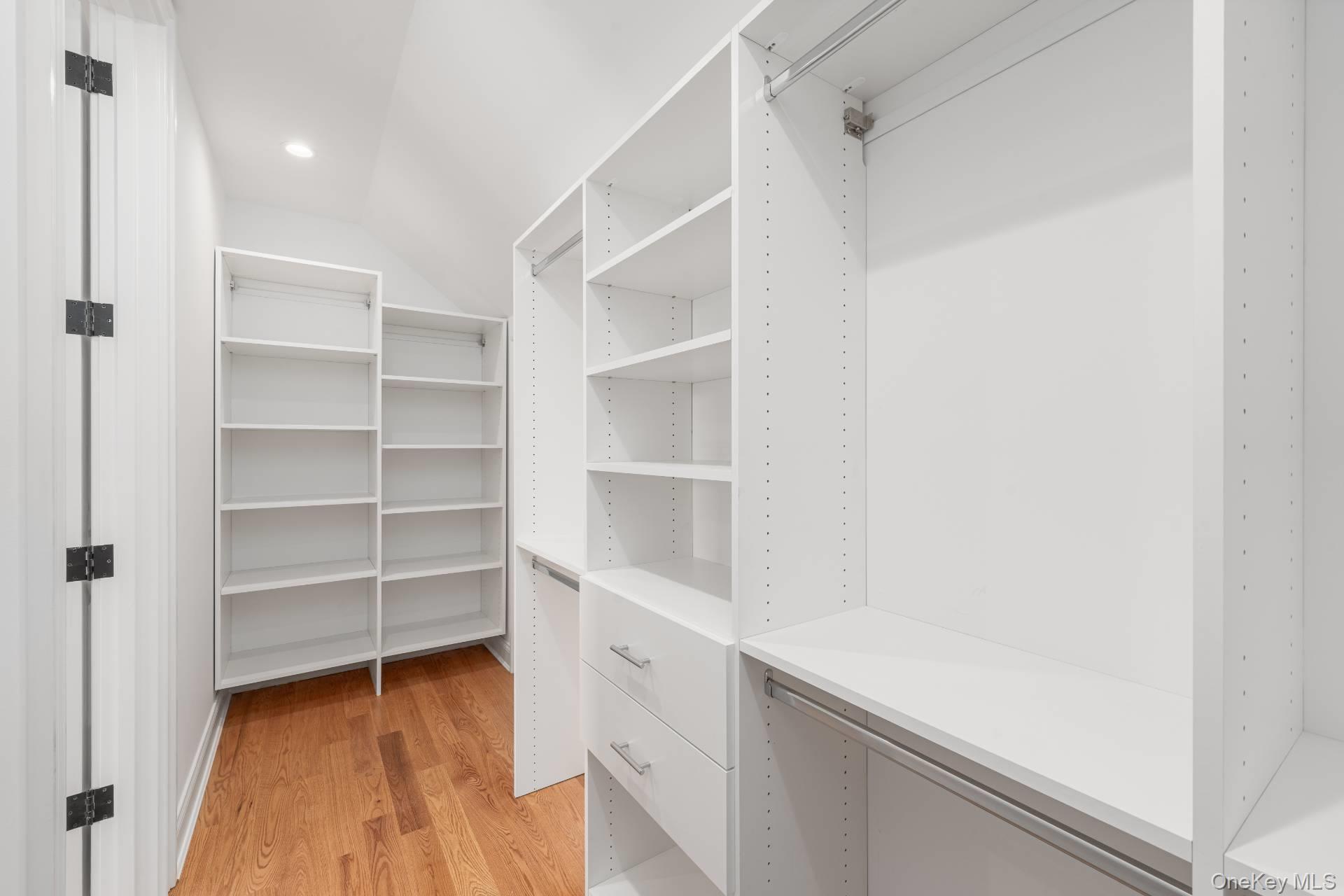 295 Grange Road Southold, NY 11971 - Photo 25 of 50 a view of walk in closet with empty racks