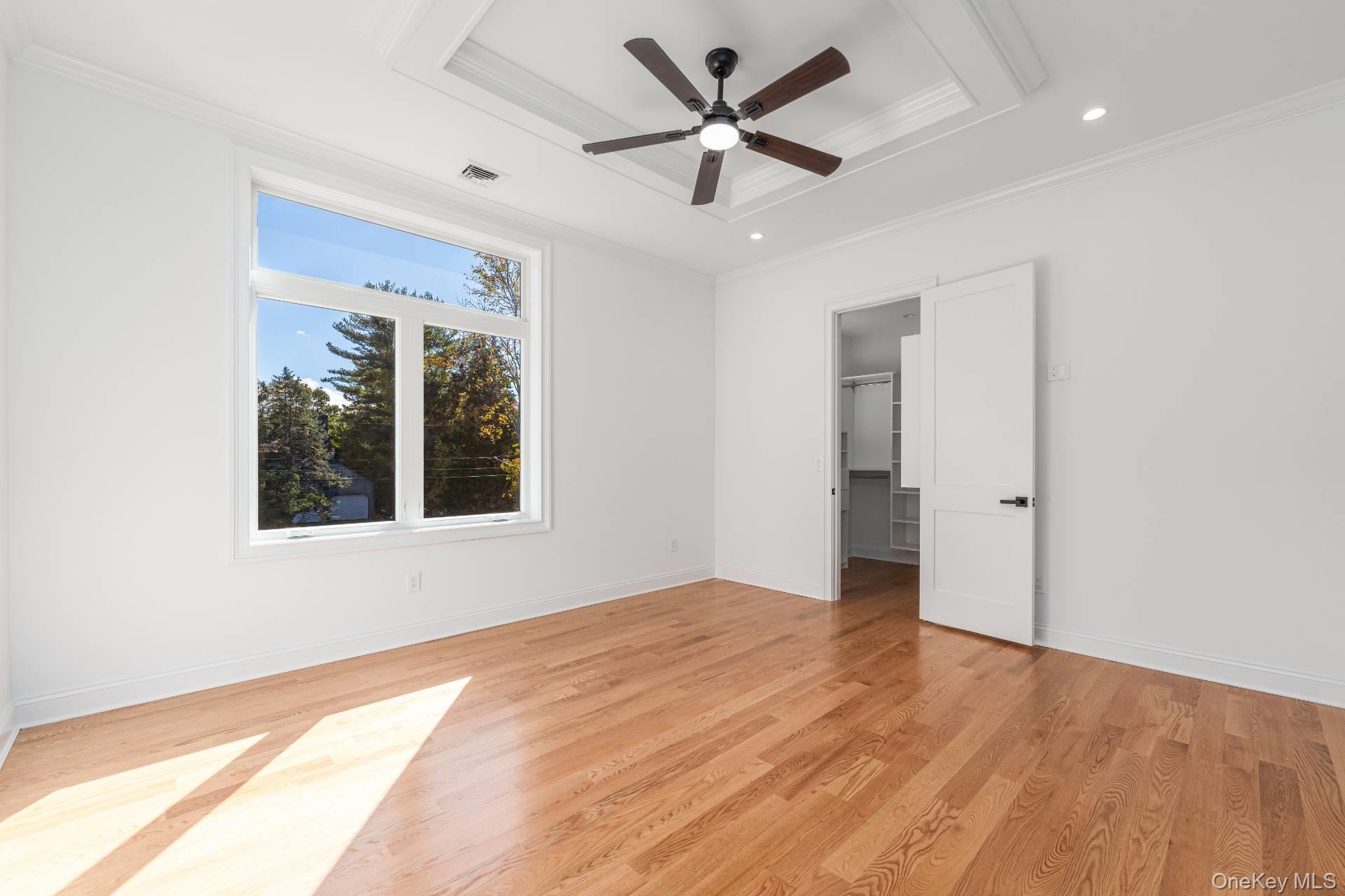 295 Grange Road Southold, NY 11971 - Photo 29 of 50 a view of an empty room with a window