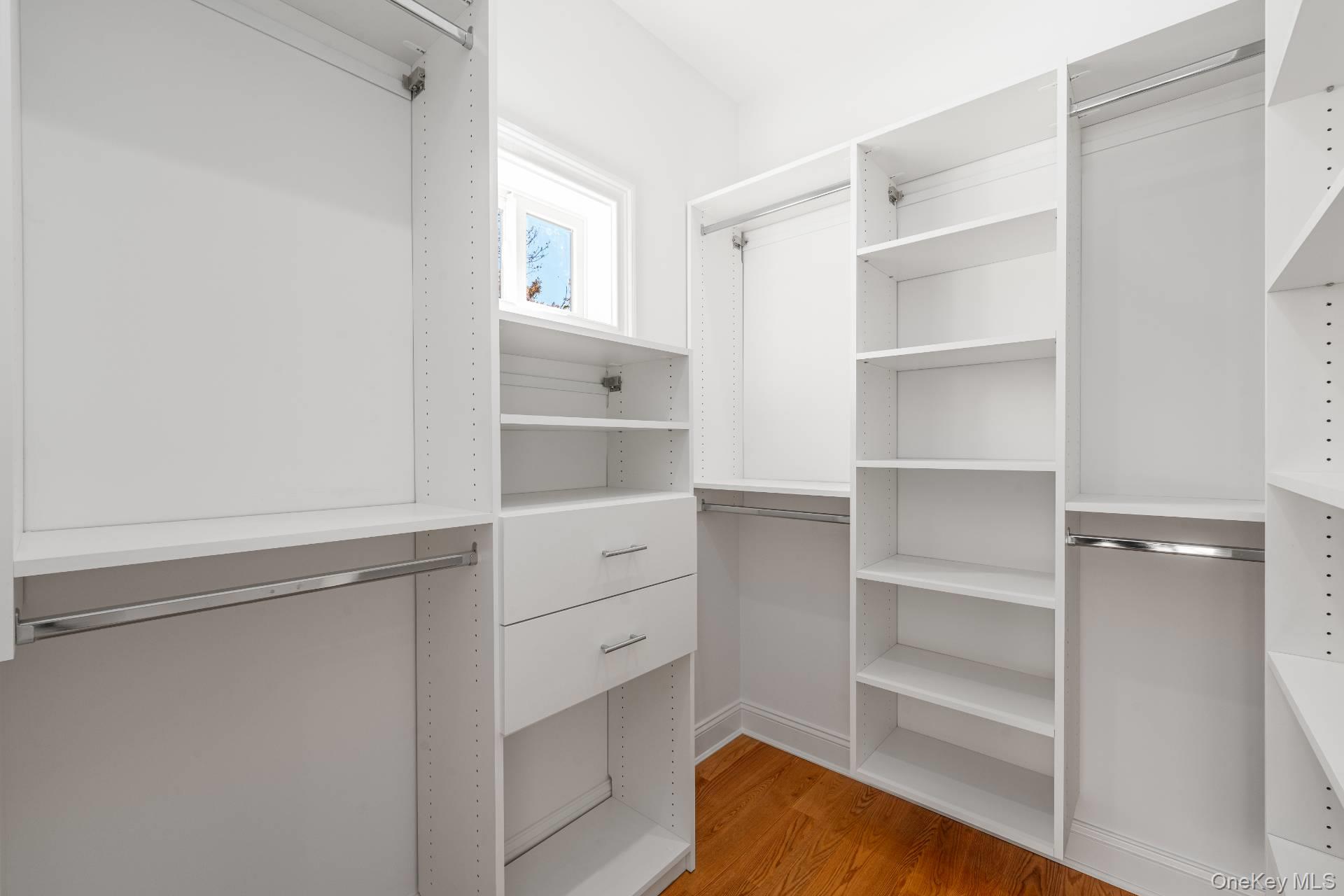 295 Grange Road Southold, NY 11971 - Photo 31 of 50 a view of walk in closet with empty racks