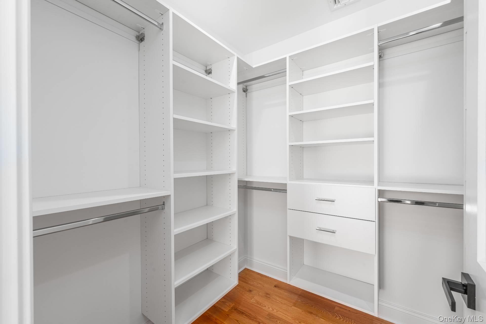 295 Grange Road Southold, NY 11971 - Photo 35 of 50 a view of walk in closet with empty racks