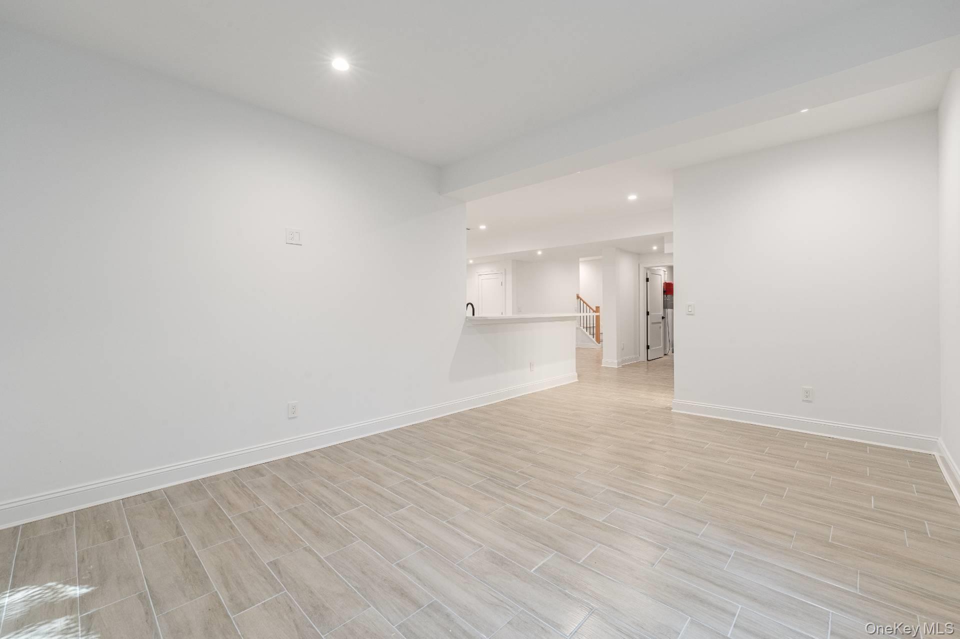 295 Grange Road Southold, NY 11971 - Photo 39 of 50 a view of empty room with wooden floor