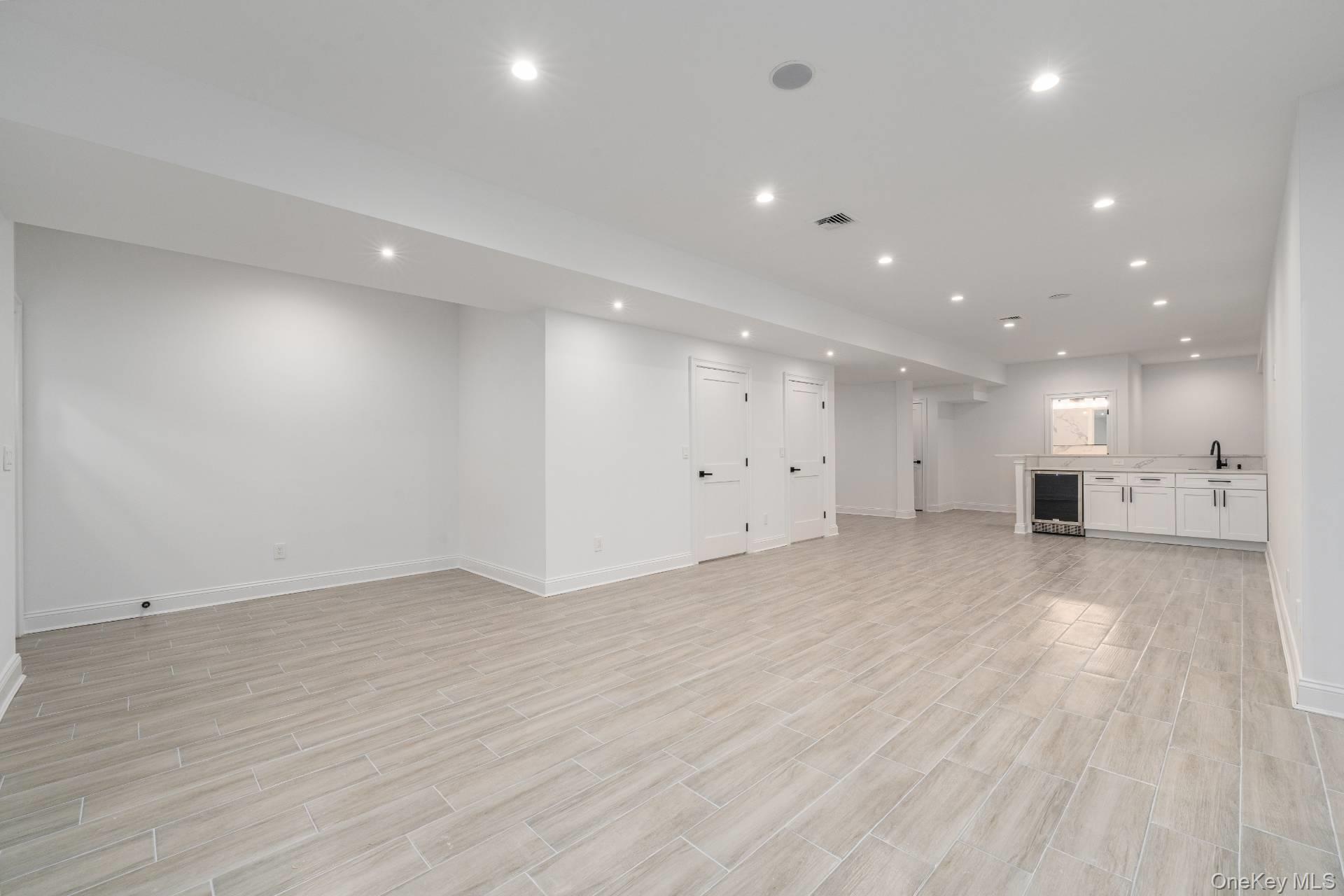 295 Grange Road Southold, NY 11971 - Photo 40 of 50 a view of an empty room and kitchen view