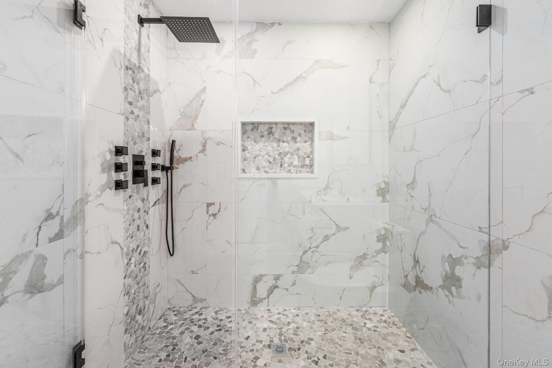 295 Grange Road Southold, NY 11971 - Photo 42 of 50 a bathroom with a shower