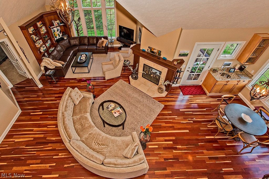 3375 Legends Way Cleveland, OH 44124 - Photo 2 of 33 Spectacular Great Room with Soaring Ceilings, Natural Cherry Hardwood Floors, Custom Built-ins and Two Sided Fireplace
