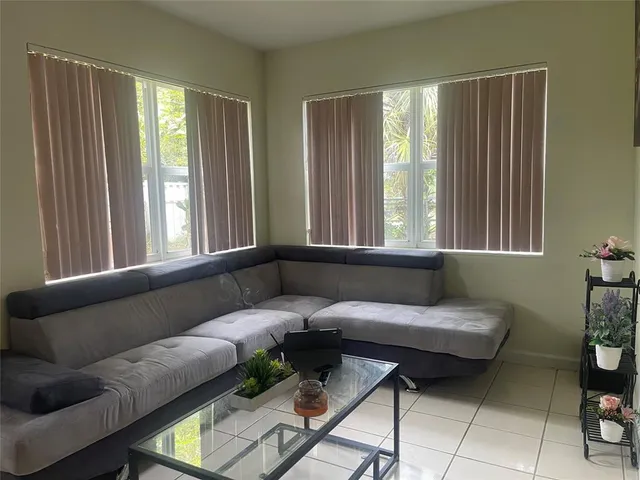 a bathroom with a shower and a toilet