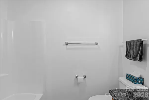 a bathroom with a toilet
