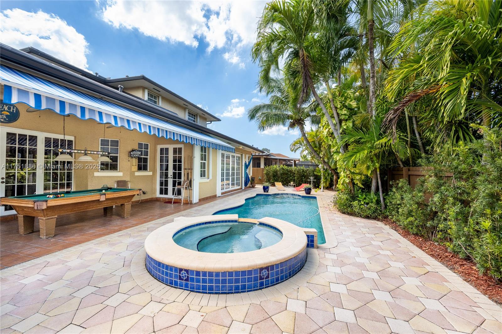 14201 Southwest 34th Street Miami, FL 33175 - Photo 2 of 33 a swimming pool with outdoor seating