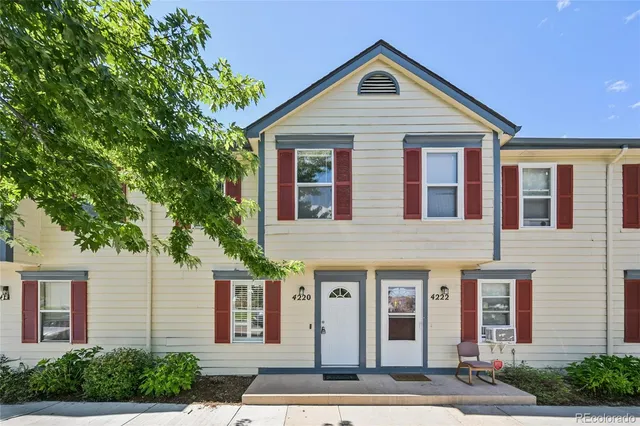 a front view of a house with yard