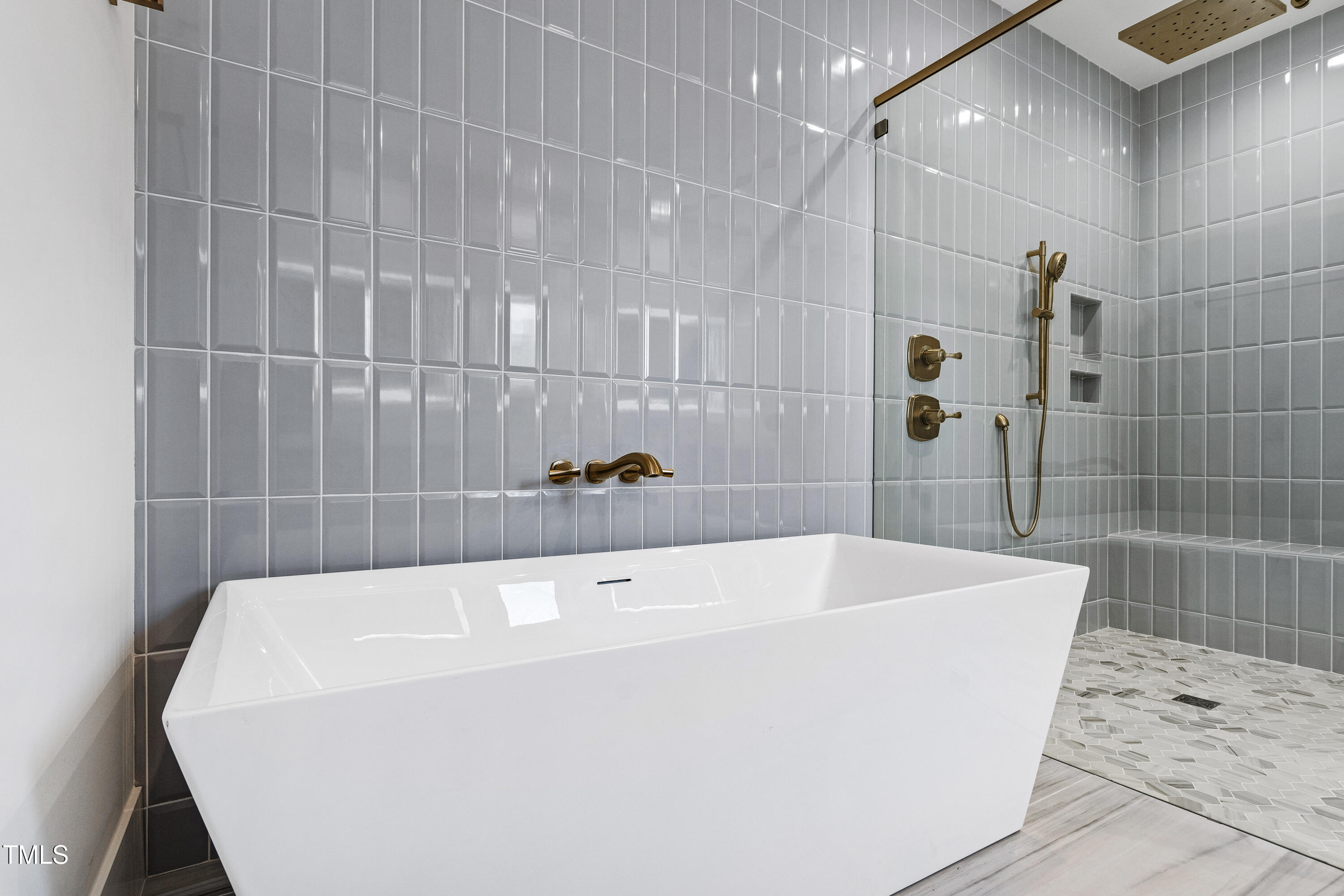 1610 Carson Street Raleigh, NC 27608 - Photo 29 of 64 a white bath tub sitting in a bathroom and shower