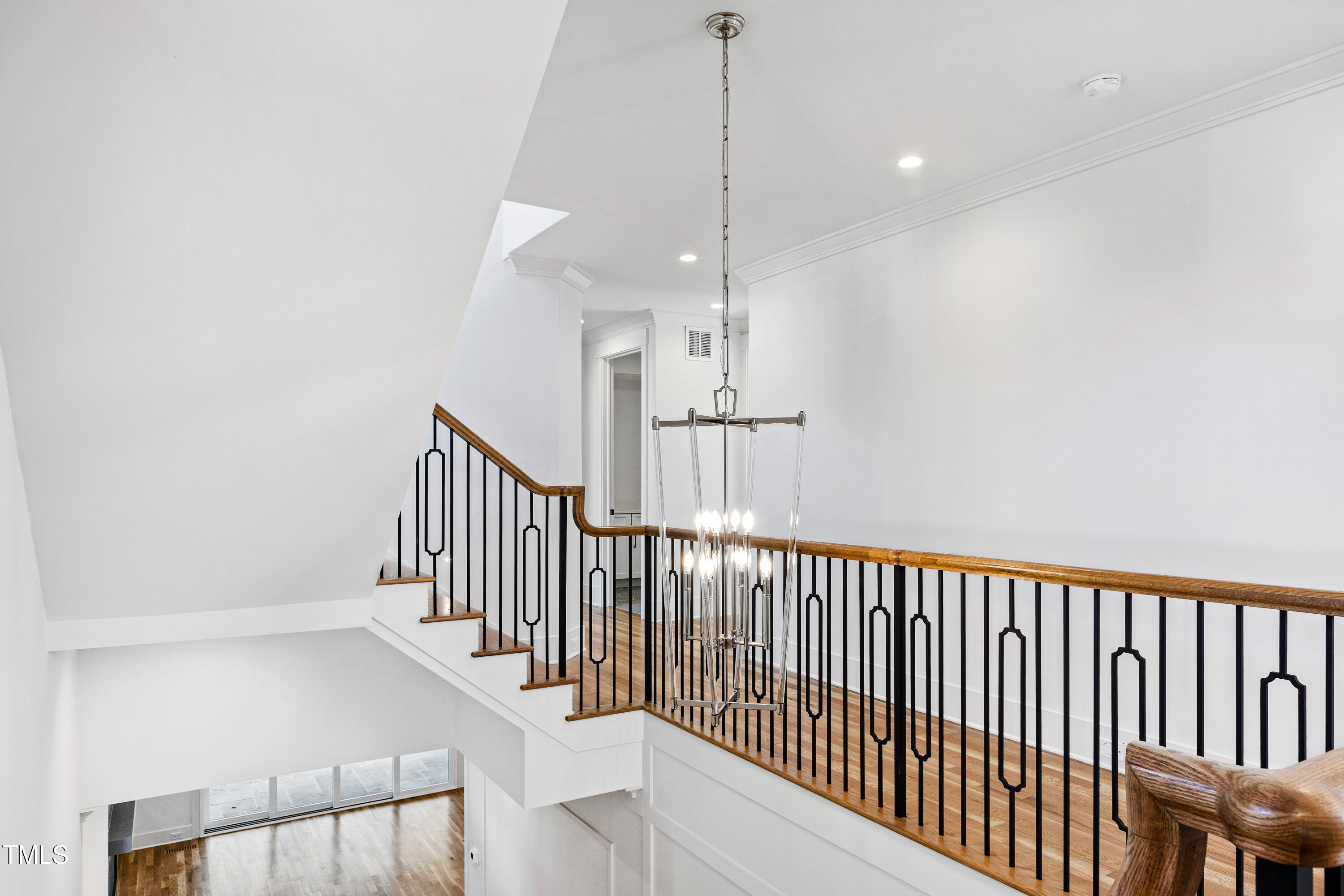 1610 Carson Street Raleigh, NC 27608 - Photo 35 of 64 a view of a hallway with stairs