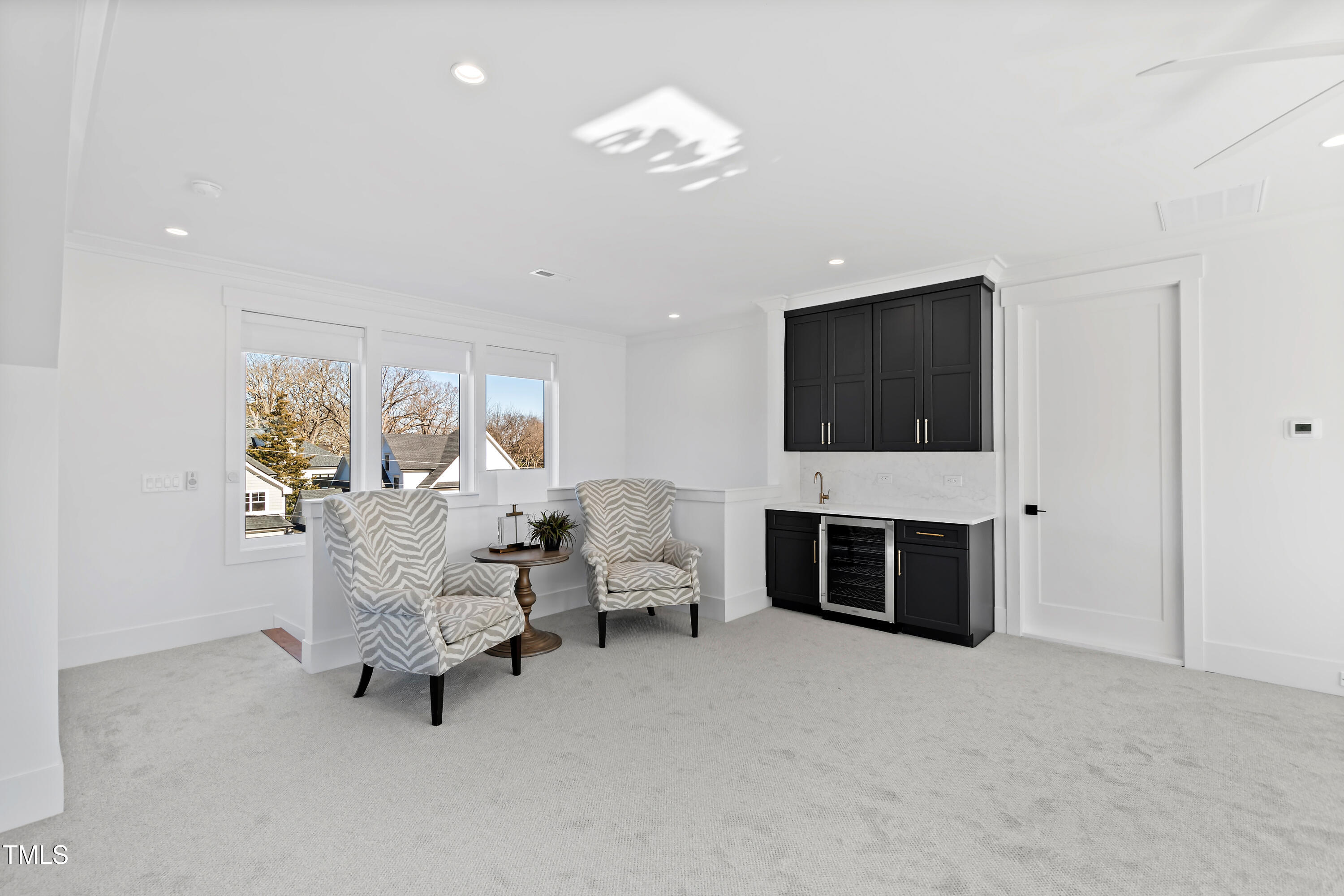 1610 Carson Street Raleigh, NC 27608 - Photo 56 of 64 a living room with furniture fireplace and flat screen tv