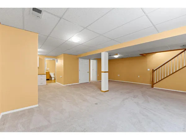 a view of a livingroom with a staircase