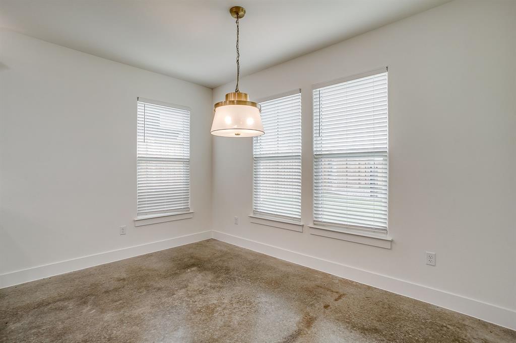 108 Cardinal Wds Granbury, TX 76049 - Photo 11 of 22 a view of an empty room with a window