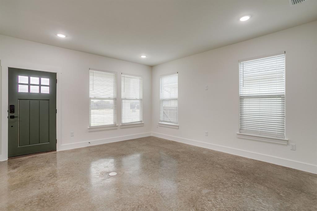 108 Cardinal Wds Granbury, TX 76049 - Photo 3 of 22 an empty room with windows