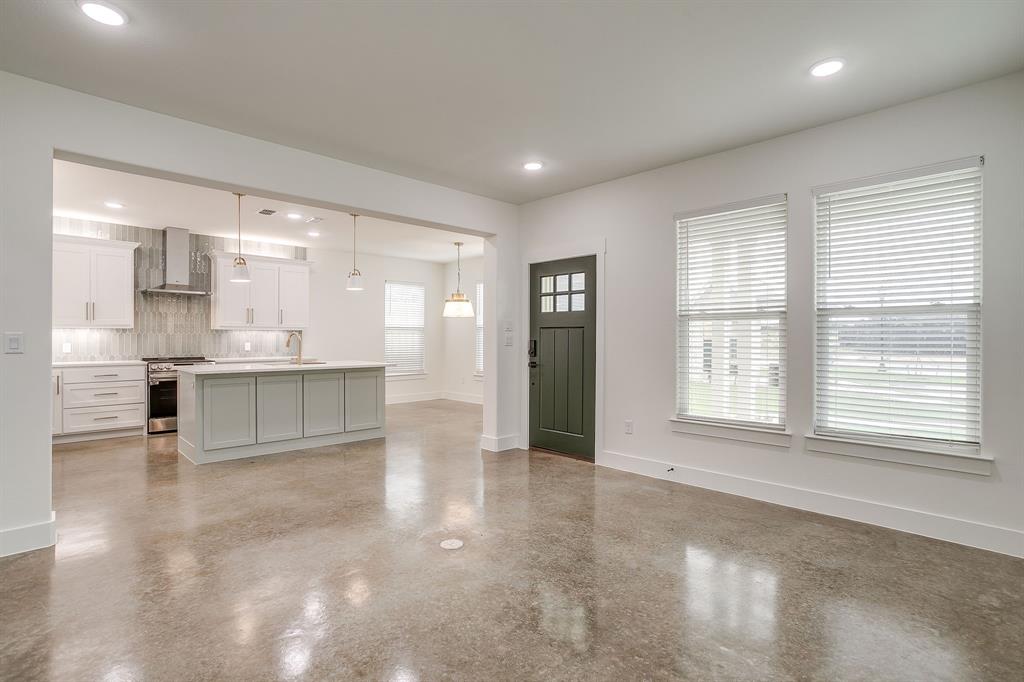 108 Cardinal Wds Granbury, TX 76049 - Photo 4 of 22 a view of kitchen with windows and chandelier