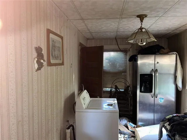 a aerial view of a house with a yard